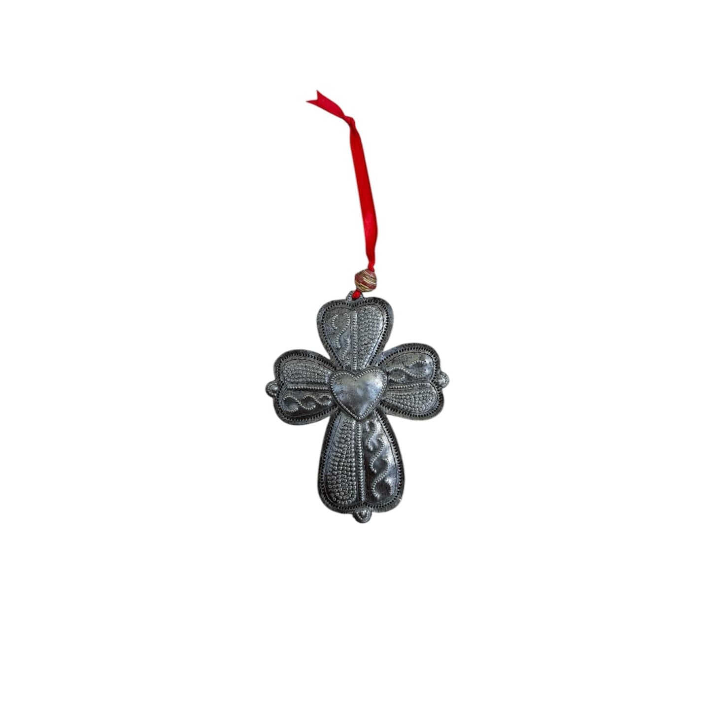 Handcrafted metal cross ornament with heart center, red ribbon hanger, Haitian artisan decor