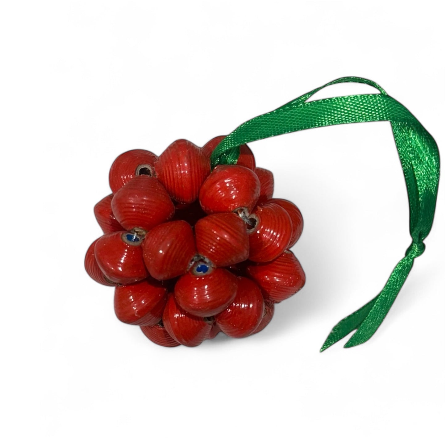 Handmade Cluster Bead Ornament made from recycled cereal boxes by Haitian artisans with vibrant red hand-rolled beads and a festive ribbon.
