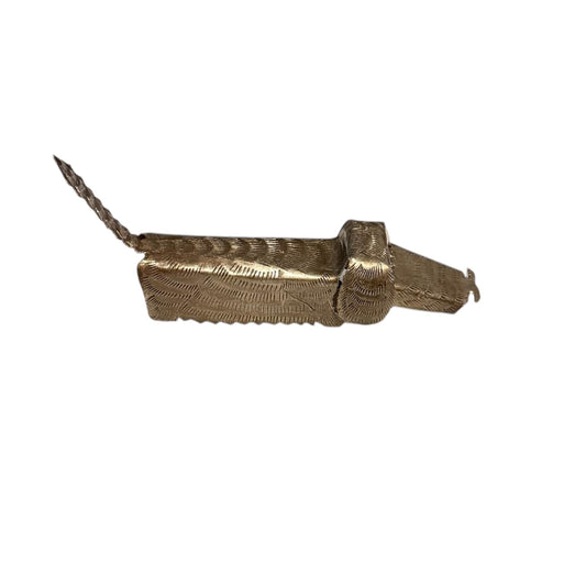 Handcrafted gold-toned dog figurine with textured details, showcasing artisanal metalwork and cultural artistry.