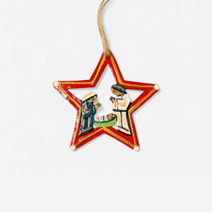 Star-shaped Christmas ornament with a Nativity scene of the Holy Family.