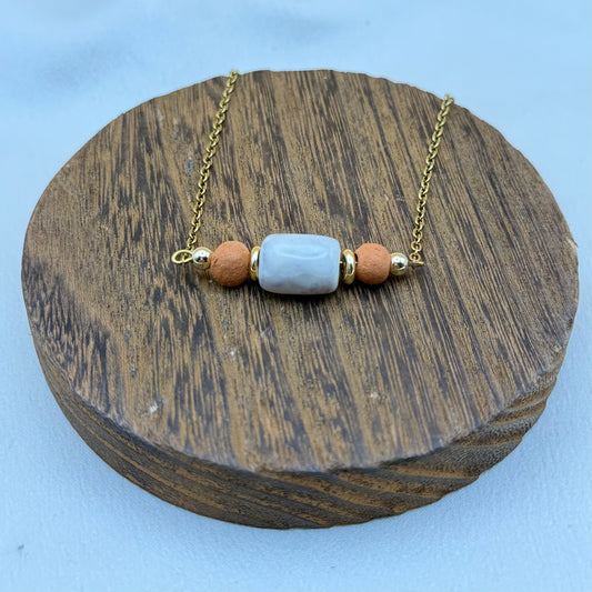 Handmade Terra Bloom necklace, bracelet, and earrings crafted by Haitian artisans with unique eco-friendly design